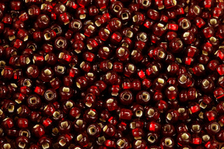 PRECIOSA rokajl 6/0 (3,7 - 4,3 mm) SH, bal. 50 g - transp. tmavší rubínově červená, SL