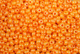 Rokajl Preciosa 6/0 (3,7 - 4,3 mm) SH, bal. 50 g - sytá oranžová s listrem, sfinx