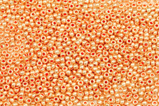 PRECIOSA rokajl 10/0 (2,2 - 2,4 mm) RH, bal. 50 g - metalická světle oranžová