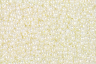 PRECIOSA rokajl 9/0 (2,4 - 2,8 mm) RH, bal. 50 g - světloučce vanilkově žlutá, listr
