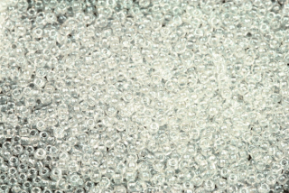PRECIOSA rokajl 11/0 (2,0 - 2,2 mm) RH, bal. 50 g - krystal s listrem, sfinx