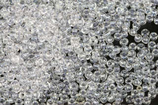 PRECIOSA rokajl 8/0 (2,8 - 3,2 mm) RH, bal. 50 g - krystal s listrem, sfinx